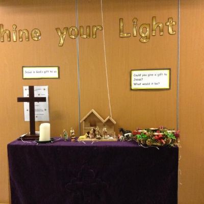 Candle group changing the alter to advent colours
