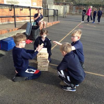 Children enjoying playing 'Thoughtful Jenga' at playtime-thank you for creating this Candle Group!